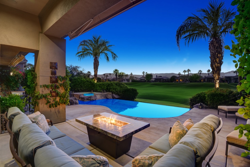 001COVERED BACK PATIO TO FIREPIT POOL AND VIEW NIGHT