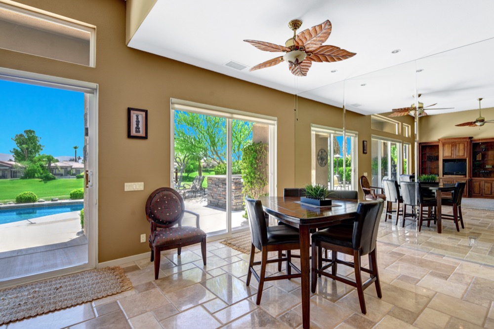 002DINING ROOM TO POOL AND VIEW